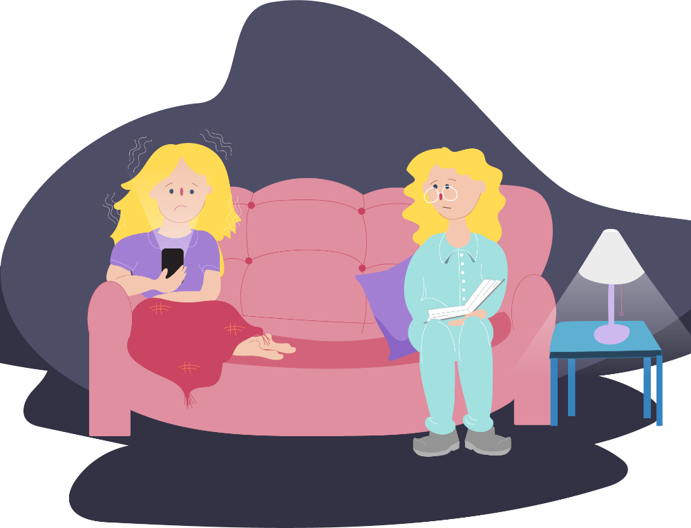 Teen girl sitting on couch looking at her phone with a worried face, Mum next to her Teen girl sitting on couch looking at her phone with a worried face, Mum next to her