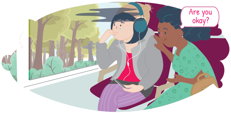 Woman comforting sad teen on train asking, 'Are you ok?' Woman comforting sad teen on train asking, 'Are you ok?'